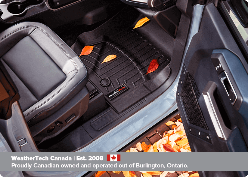 A laser-measured FloorLiner protecting a car's floor from yellow and brown leaves A laser-measured FloorLiner protecting a car's floor from yellow and brown leaves